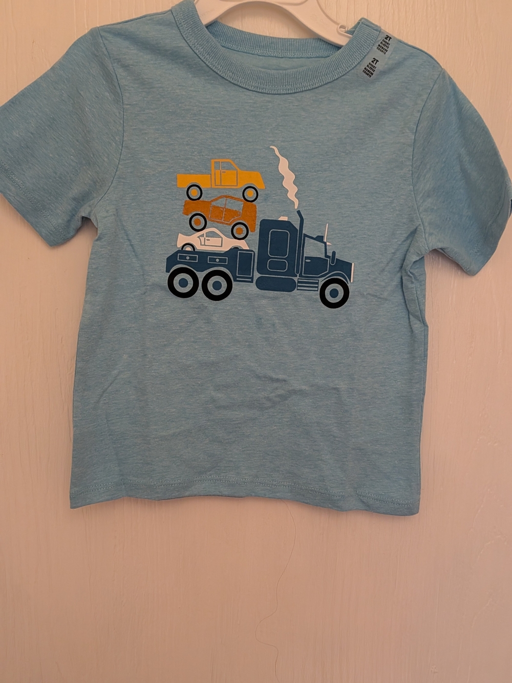 The Children's Place Light Blue Tee with Truck Stack Graphic